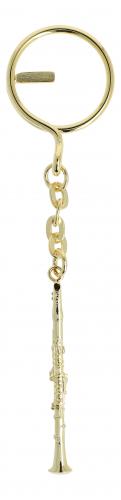 golden, shaped metal key pendant - instruments / design: clarinet