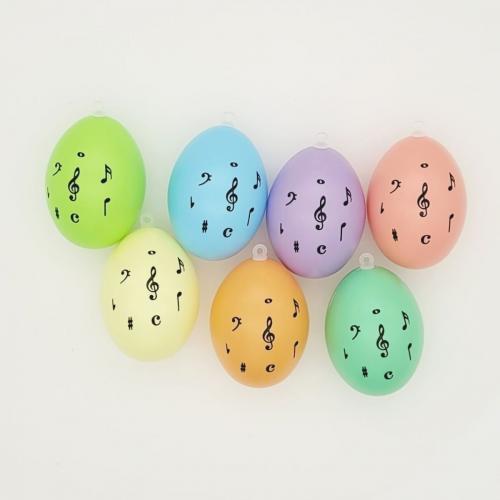 Set of 7 decoration Easter eggs with treble clef and notes, different colors - motif: pastel
