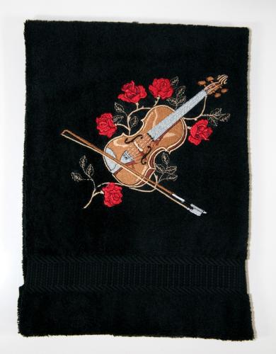 black towel with a violin entwined with roses