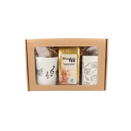 Gift set with musician's tea, music mug with staves and treble clef, tea/coffee tin with printed music and instrument in folding box with window