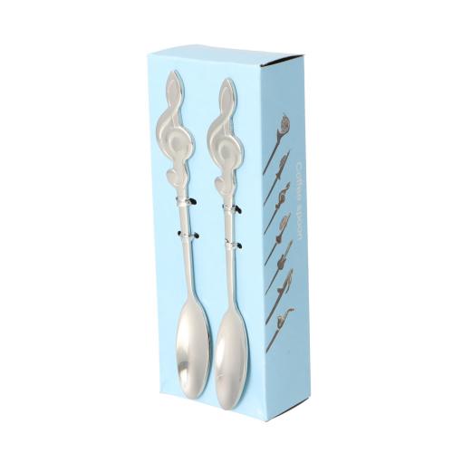Small coffee / espresso spoons made of stainless steel, different motifs - instruments / design: treble clef